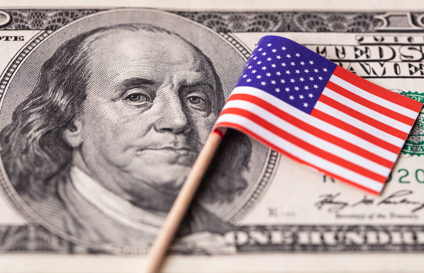 U.S. 100 dollar banknote on american flag background