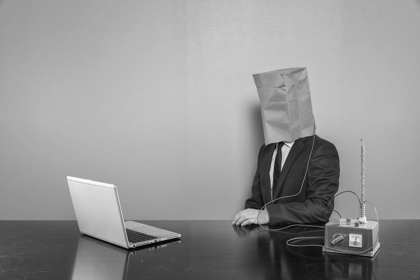 Vintage businessman sitting at office desk