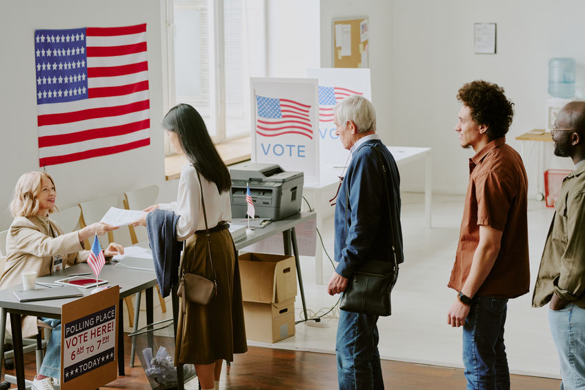 Citizens Standing In Line At Voting Station