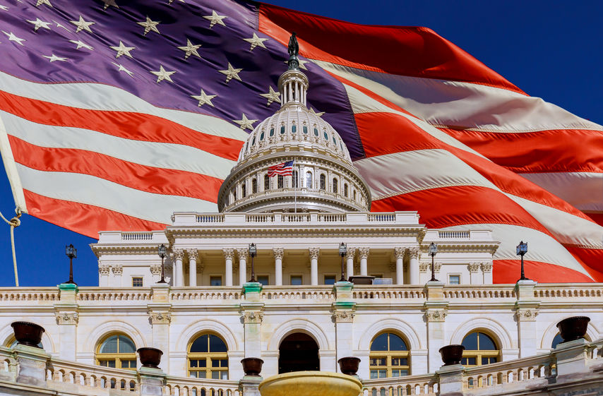 The US Capitol in Washington DC with American flag