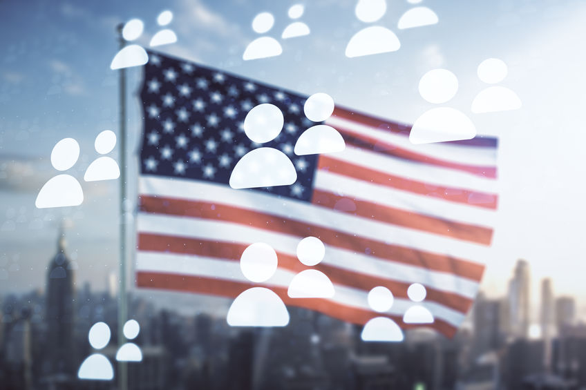 Abstract virtual social network hologram on USA flag and blurry skyscrapers background. Double exposure